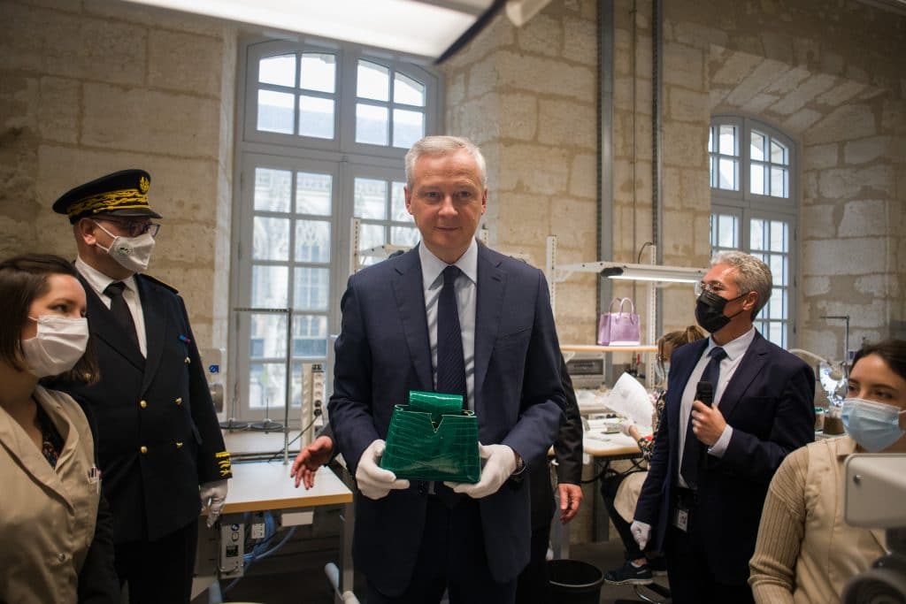 Bernard Arnault leaves the Vuitton show at le carreau du temple